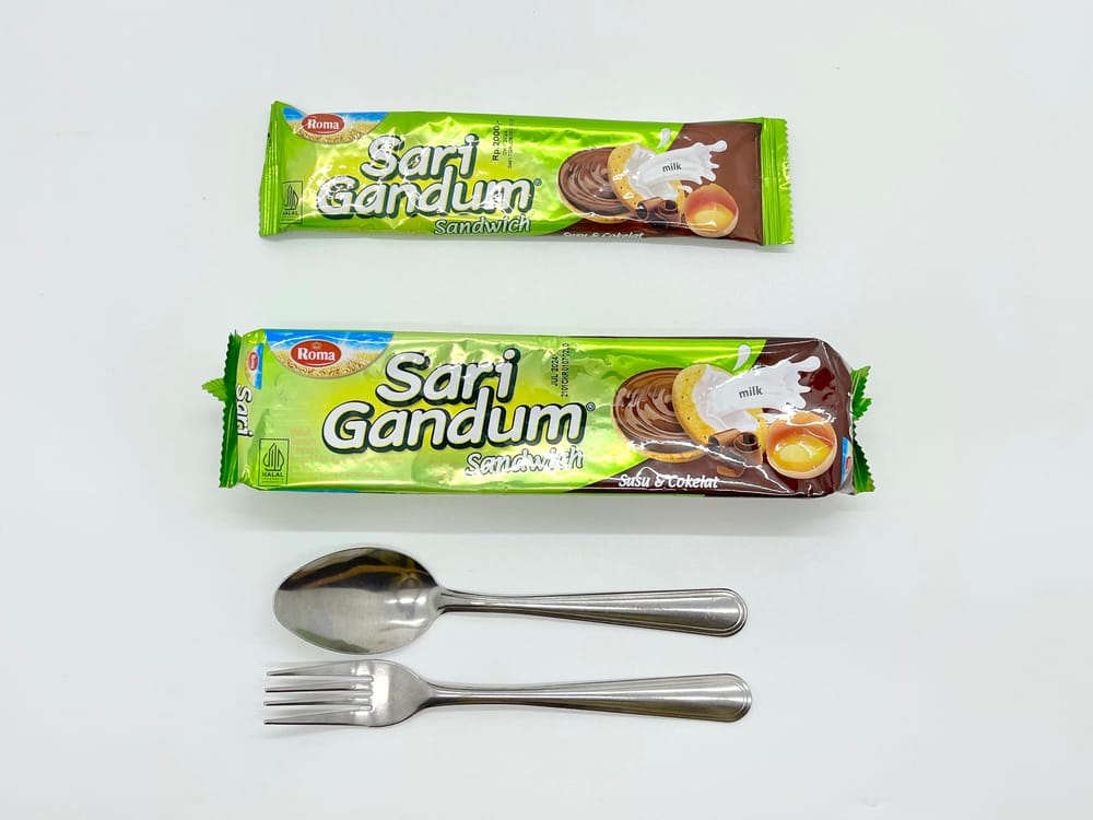 Whole grain sandwich biscuits with chocolate filling
